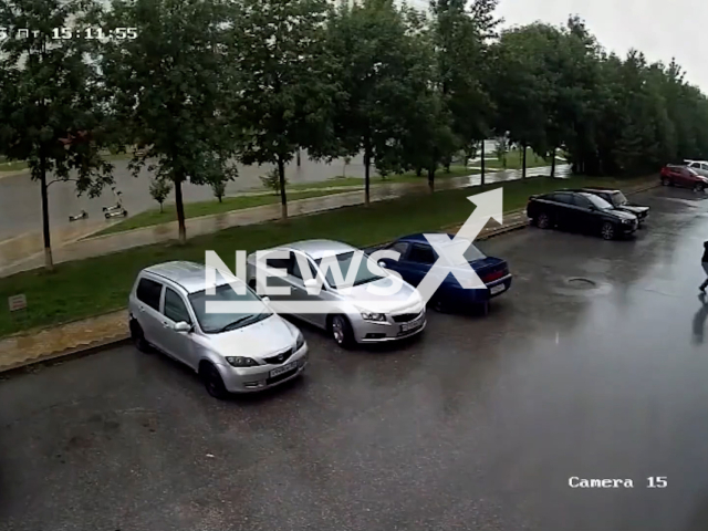 This image is a screen grab of the video supplied titled NewsX-RobChild-01.mp4: CCTV footage shows a man attacking a boy with a knife and stilling his bag, which contained more than more than a million rubles in Novosibirsk, Russia on Friday. Aug 8, 2025.(Clipzilla/NX)