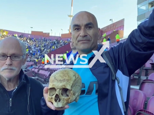 Gabriel Aranda (right) brought the skull of his grandfather Valentin on the match between Boca and Racing for the semifinals of the League Cup in May 2022. Note: Photo is a screenshot from a video(Newsflash).