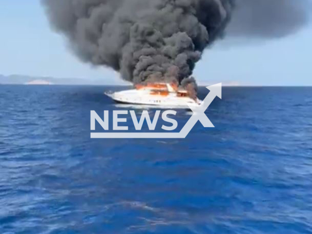 A luxury yacht burns near Formentera, Spain, on Aug.11, 2025. There were no victims. Note: Photo is a screenshot from a video(@salvamentogob/Newsflash/NX)