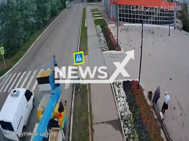 This image is a screen grab of the video supplied titled NewsX-IntensiveEld-01.mp4: Footage shows 69-year-old woman crossing the street on zebra being hit by truck in Kodinsk, Russia on Tuesday, Aug 12, 2025.(Clipzilla/NX)