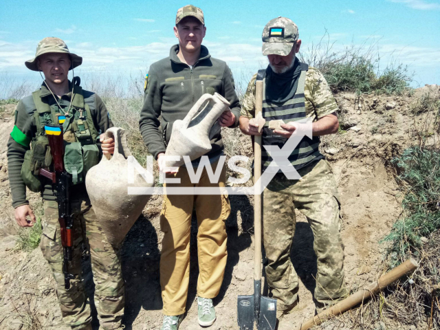 126 separate brigade of territorial defense of Odessa found ancient amphoras while digging trenches  in Odessa, Ukraine. Note: Photo shared by military base. (126 separate brigade of territorial defense of Odessa/Newsflash)