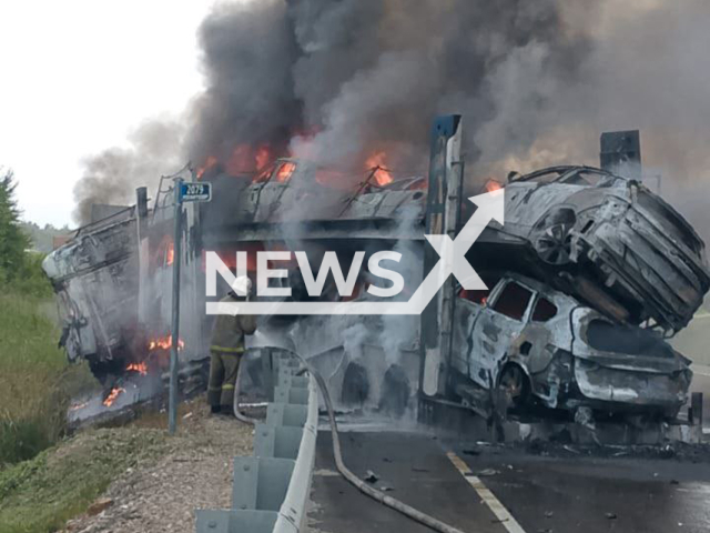 Photo shows destroyed and burned vehicles in a car transporter after the crash with the mixer near Klyuchevoe, Jewish Autonomous Region, Russia on Wednesday, Aug 13, 2025. \
Note: Police photo.
(Clipzilla/NX)