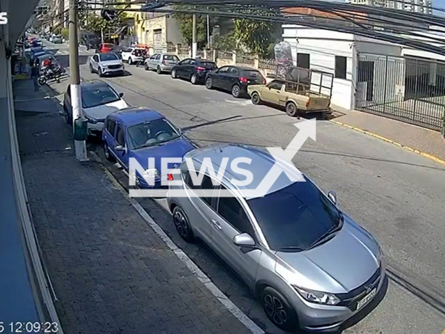 A pickup truck "flies" among vehicles in Tucuruvi, Sao Paulo, Brazil, on Aug.14, 2025. It hit about 10 parked vehicles. Note: Photo is a screenshot from a video. (Newsflash/NX)