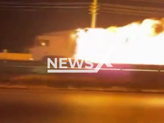 Truck in flames drives on highway in Samsun, Turkey, undated. The truck driver continued to drive the vehicle engulfed in flames for 8 kilometers due to brake failure. Note: Photo is a screenshot from a video. (Newsflash/NX)