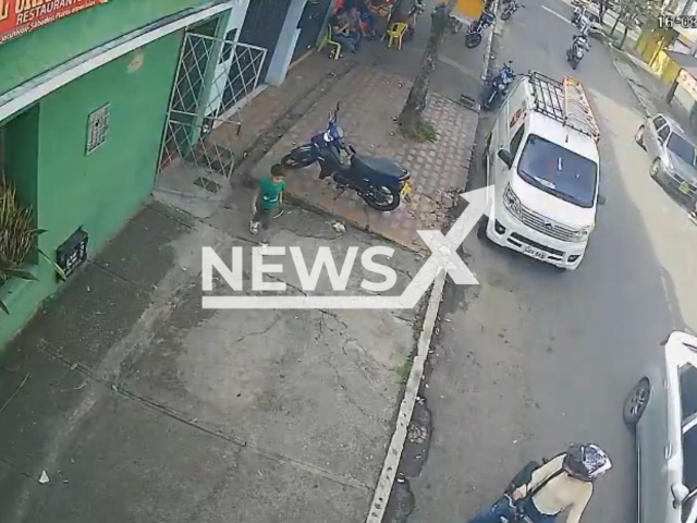 Boy saves himself being just inches from a wall collapse in Bucaramanga, Colombia, Aug. 16, 2025. The boy was leaving a restaurant. Note: Photo is a screenshot from a video(Newsflash/NX)