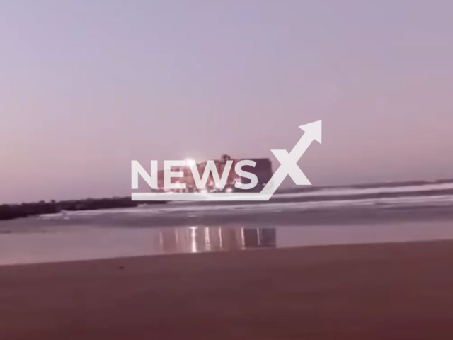 A massive container ship is obstructed by strong winds at the Port of Imbituba, Brazil, on Aug.20,2025. Note: Photo is a screenshot from a video(Newsflash/NX)