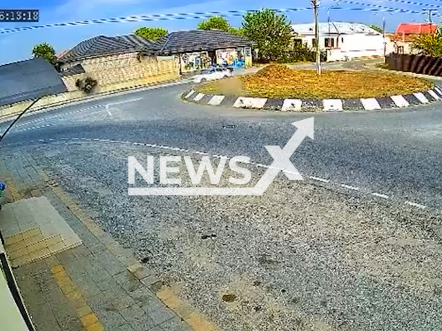 This image is a screen grab of the video supplied titled NewsX-NewBike-01.mp4: A biker crashes with a motorbike in the village of Anzorey in Kabardino-Balkaria, Russia, on Aug.20, 2025.