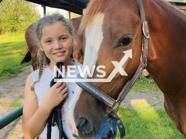 Jules Lyssens, 11, poses with a pony in undated photo. She died after being seriously injured in a fall during a pony tournament in Sint-Lenaarts, Belgium, on 10 August 2025. Note: Private photo from social media. (Sofie Eyskens/Newsflash/NX)
