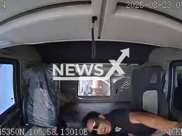 This image is a screen grab of the video supplied titled NewsX-VietScooter-01.mp4: Footage shows truck at full speed avoiding to hit couple on scooter hit and killed motorist in Ha Nam province, Vietnam on Saturday, Aug 23, 2023.(Clipzilla/NX)