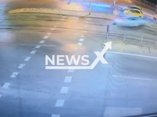 This image is a screen grab of the video supplied titled NewsX-DramaticSpeed-01.mp4: CCTV footage shows 21-year-old Viktor Iliev driving an Audi RS5 at high speed and crashing into a bus at a traffic light on Konstantin Velichkov Blvd. in Sofia, Bulgaria, on Friday, Aug. 15, 2025.(Clipzilla/NX)
