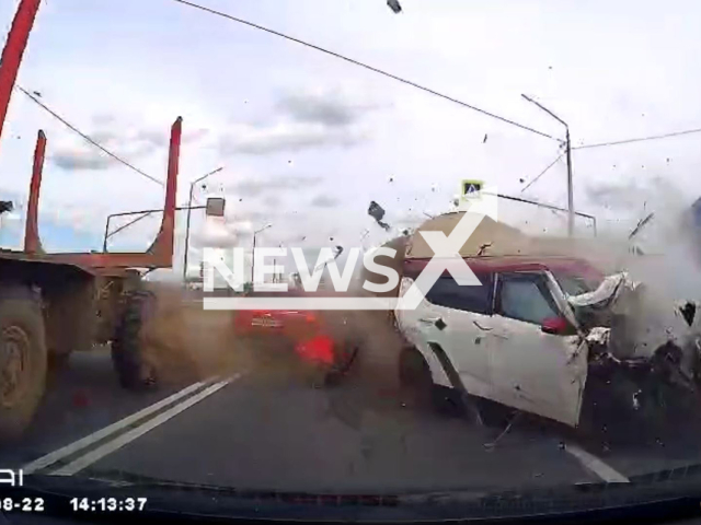 This image is a screen grab of the video supplied titled NewsX-MultiCarColl-01.mp4: Footage shows a truck-mounted vehicle veering into the oncoming lane and colliding with three foreign cars on a federal highway near Sudislavl in Kostroma Oblast, Russia, on Friday, Aug. 22, 2025.(Clipzilla/NX)