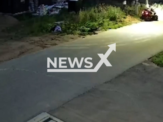 This image is a screen grab of the video supplied titled NewsX-InjureNight-01.mp4: Footage shows two children on ATV losing control and hitting two pedestrians near Solnechnogorsk, Moscow Oblast, Russia on Thursday, Aug 21, 2025.(Clipzilla/NX)
