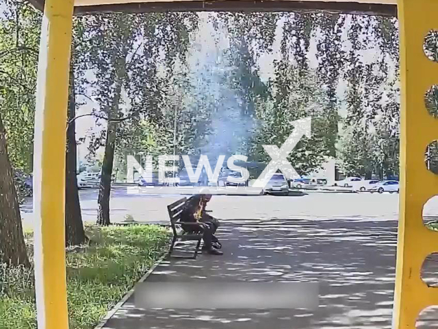 A drunk smoker on a bench almost burns alive in the city of Naberezhnye Chelny, Russia, undated. According to local media the man received second- and third-degree burns. Note: Photo is a screenshot from a video. (Newsflash/NX)