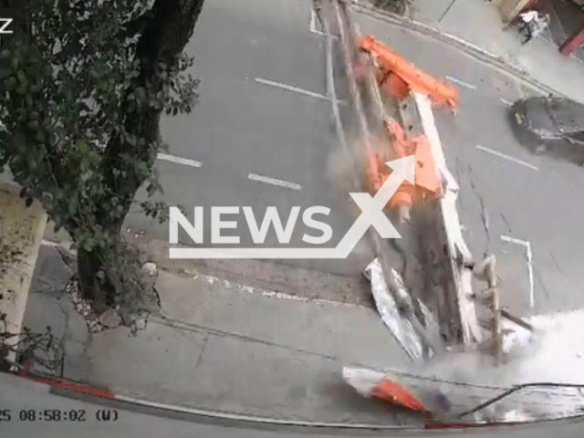 This image is a screen grab of the video supplied titled NewsX-CreinRoud-01.mp4: Footage shows machine falling from construction site Infront of vehicle in Sao Paulo, Brazil on Tuesday, Aug 26, 2025.(Clipzilla/NX)