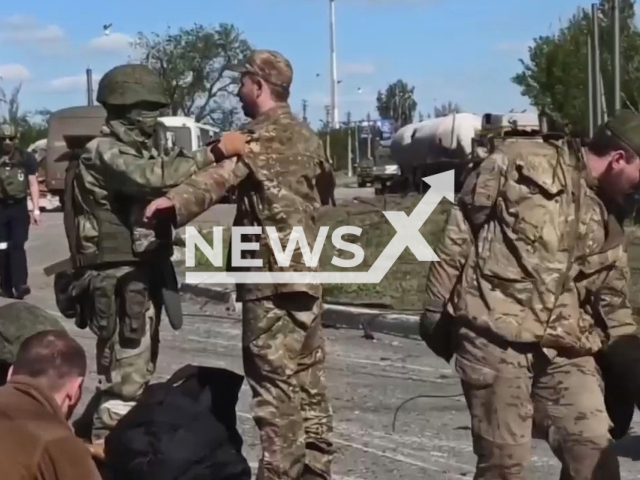 265 militants laid down their arms and surrendered, including 51 seriously wounded who were taken for treatment to a hospital in the city of Novoazovsk, in May 2022. Note: Picture is a screenshot from a video (Ministry of Defense of Russia/Newsflash)