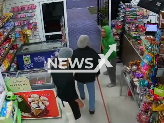 This image is a screen grab of the video supplied titled NewsX-BekerThif-01.mp4: Footage shows bakery owner together with an employee chases away thief with brooms in Curitiba, Brazil on Sunday, Aug 24, 2025.(Clipzilla/NX)