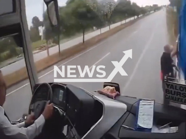 This image is a screen grab of the video supplied titled NewsX-Twideadbus-01.mp4: Footage shows the driver veering into the emergency lane, hitting pedestrians next to the pickup truck, and then diving into a cornfield on the Samsun-Ordu highway, near Gundogdu, Turkey on Monday, Aug 25, 2025.(Clipzilla/NX)