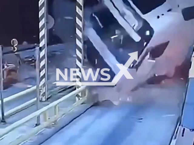 This image is a screen grab of the video supplied titled NewsX-TruckBlaze-01.mp4: CCTV footage shows truck in high speed slamming into toll booth near the exit to Rzepin, Poland on Saturday, Aug 23, 2025.