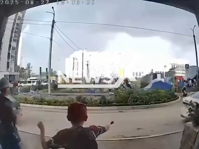 This image is a screen grab of the video supplied titled NewsX-BouncyWind-01.mp4: Footage shows strong wind overturning a trampoline with children, five were injured in Ufa, Bashkortostan, Russia on Thursday, Aug 27, 2025.(Clipzilla/NX)