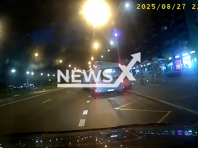 This image is a screen grab of the video supplied titled NewsX-PassangerDoor-01.mp4: Footage shows woman after trapped by bus doors being dragged approximately for 100 meters before she fails in the street in Saint Petersburg, Russia on Wednesday, Aug 27, 2025.(Clipzilla/NX)