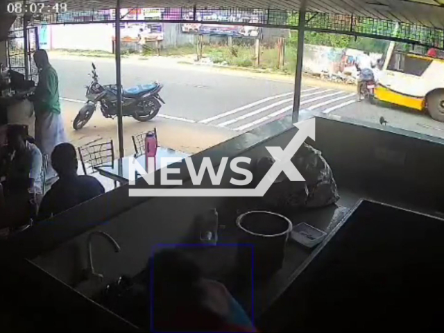 This image is a screen grab of the video supplied titled NewsX-BusSpeed-01-01.mp4: Footage shows speeding bus fatally crashing into biker and pedestrian in Tamil Nadu, India on Friday, Aug 29, 2025.(Clipzilla/NX)