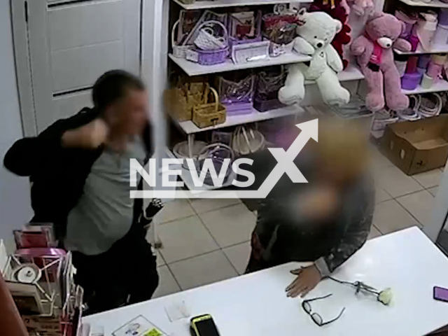 This image is a screen grab of the video supplied titled NewsX-SalesBeat-01.mp4: Police released video of a 42-year-old man beating the flower shop saleswoman in order to steal a bouquet and a teddy bear in Volgograd, Russia, undated. The Russian Ministry of Internal Affairs released the security camera footage on Friday, Aug 29, 2025.(Clipzilla/NX)