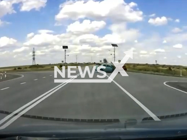 This image is a screen grab of the video supplied titled NewsX-CrashNear-01.mp4: Footage shows two cars colliding at an intersection in Stanytsia-Luhanska Raion, Ukraine, on Tuesday, Aug. 26, 2025.(Clipzilla/NX)
