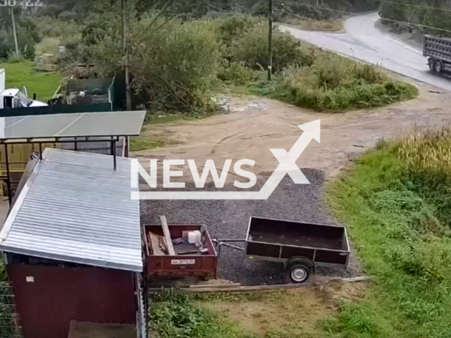 This image is a screen grab of the video supplied titled NewsX-FatalDriver-01.mp4: CCTV footage shows a truck colliding head-on with a Lada Niva, killing a 66-year-old man on a road near Bogorodskoye, Moscow Oblast, Russia, on Sep. 1, 2025. (Clipzilla/NX)