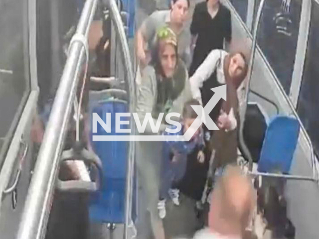 This image is a screen grab of the video supplied titled NewsX-DriverSaviour-01.mp4: Footage shows bus driver saving a child's life by performing the Heimlich maneuver on him after he choked on chips and couldn't breathe in Kocaeli, Turkey, undated. Footage released on (X) formal Twitter on Monday, Sep 1, 2025.(Clipzilla/NX)