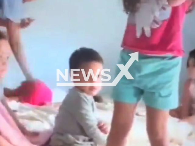 Employees of a small hotel wake children with screams and jets of water in Linhares, northern Espirito Santo, Brazil, undated. The Civil Police are investigating the case. Note: Photo is a screenshot from a video(Newsflash/NX)