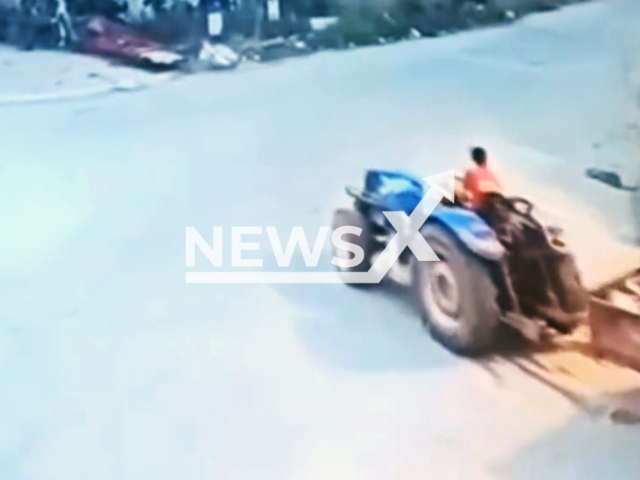 This image is a screen grab of the video supplied titled NewsX-DadTract-01.mp4: Two-year-old child crushed under tractor driven by his father in Bursa, Turkey, on 30 August 2025. The boy was hospitalised with serious injuries.(Clipzilla/NX)