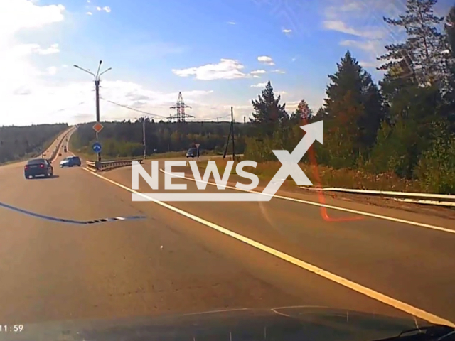 This image is a screen grab of the video supplied titled NewsX-GreatDodge-01.mp4: The dashcam shows the Toyota suddenly blocks the path, forcing a Honda to swerve off the road and crash violently in Bratsk, Irkutsk Oblast, Russia on Friday, Aug. 22, 2025.(Clipzilla/NX)