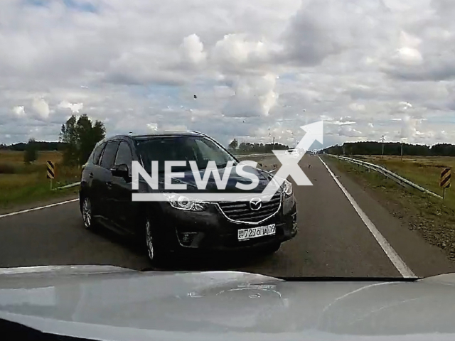 This image is a screen grab of the video supplied titled NewsX-MajorCollision-01.mp4: Footage shows a vehicle crossing into the opposite lane and hitting another car, which then loses control and crashes into a third vehicle on the Chelyabinsk-Novosibirsk highway in Kazakhstan on Monday, Sep 1, 2025.( Clipzilla/NX)