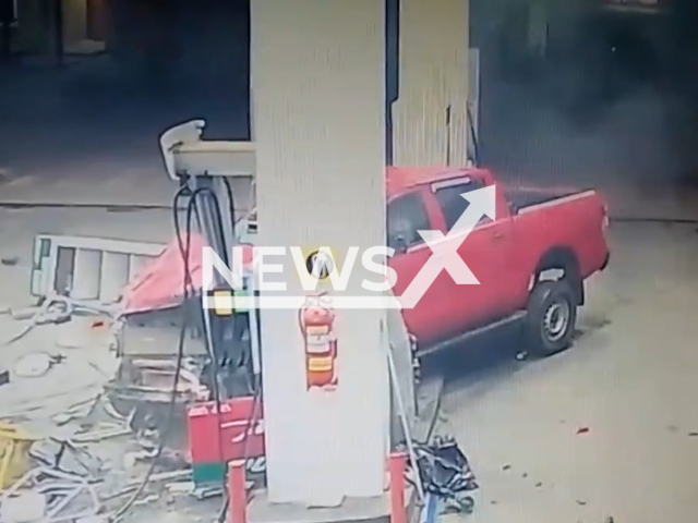This image is a screen grab of the video supplied titled NewsX-TruckerPets-01.mp4: Footage shows a pickup truck crushing into a gas station pump in San Bernardo, Argentina on Saturday, Sep 6, 2025.(Clipzilla/NX)