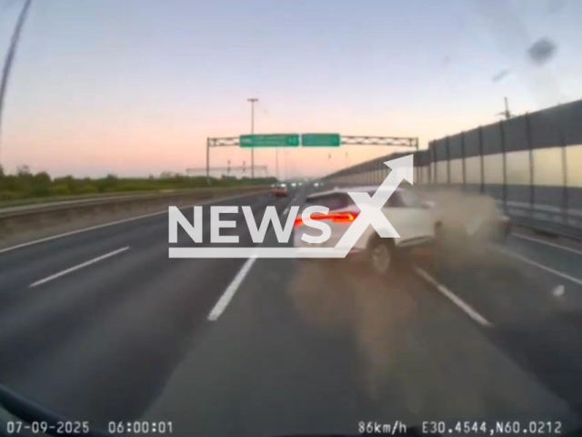 This image is a screen grab of the video supplied titled NewsX-CrashOvertake-01.mp4: Footage shows taxi in full speed colliding with stopped vehicle on the right line on the highway in Saint Petersburg, Russia on Sunday, Sep. 7, 2025.(Clipzilla/NX)