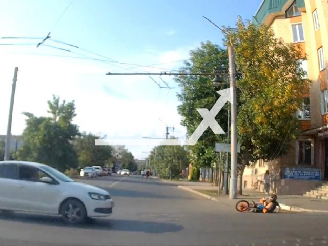 This image is a screen grab of the video supplied titled NewsX-SkidFall-01.mp4: Footage shows a pit biker being arrested after crashing during a pursuit with a police officer on a motorcycle in Orenburg, Russia on Monday, Sep. 1, 2025.(Clipzilla/NX)