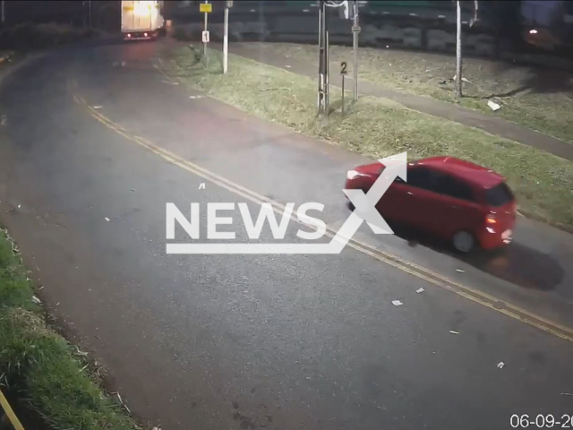 This image is a screen grab of the video supplied titled NewsX-TreiSev-01.mp4: CCTV footage shows a tuck being hit by a train in Jandaia do Sul, Parana in Brazil on Saturday, Sep. 6, 2025.