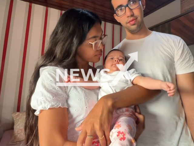 Picture shows Adrieli Rodrigues, Aryston Pádua, and their 2-month-old daughter, undated. The child was stung by a scorpion in Fernandopolis, Brazil, on Sept.07,2025. Note: Image is a screenshot from video. (Newsflash/NX)