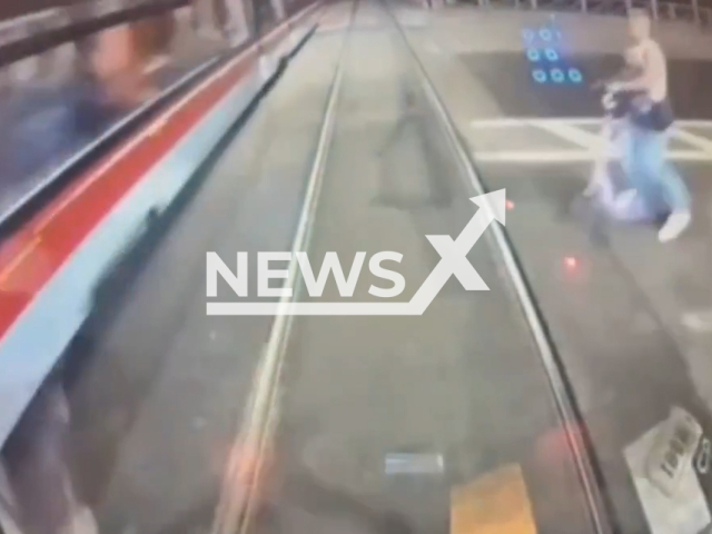 This image is a screen grab of the video supplied titled NewsX-CollisionTram-01.mp4: Footage shows tram hitting a 19-year-old  scooter rider approaching the tracks at high speed in Saint Petersburg, Russia on Sunday, Sep. 7, 2025.