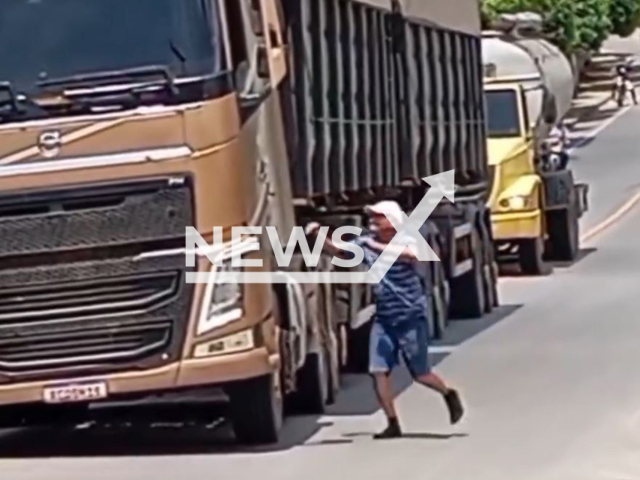 This image is a screen grab of the video supplied titled NewsX-DrunkJeiled-01.mp4: Footage shows driver leaving the moving truck to do a little dance in the middle of a hill in Machados, Pernambuco, Brazil on Monday, Sep. 15, 2025.(Clipzilla/NX)