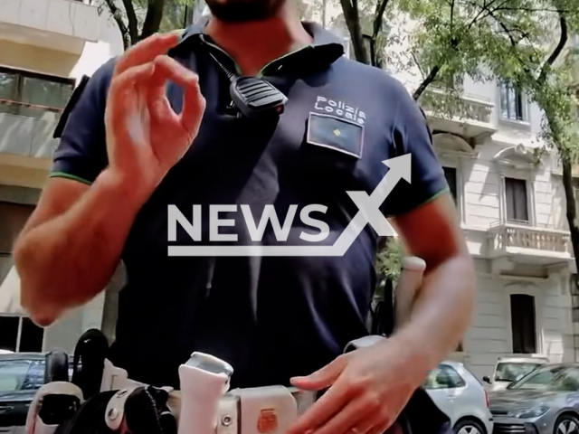 Police compliment a Ferrari driver who violated the speed limit in Milan, Italy, undated. The video sparked outrage. Note: Photo is a screenshot from a video. (Newsflash/NX)