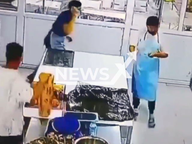 A man throws a knife at his colleague while playing in Basra, Iraq, undated. The man died. Note: Photo is a screenshot from a video(Newsflash/NX)