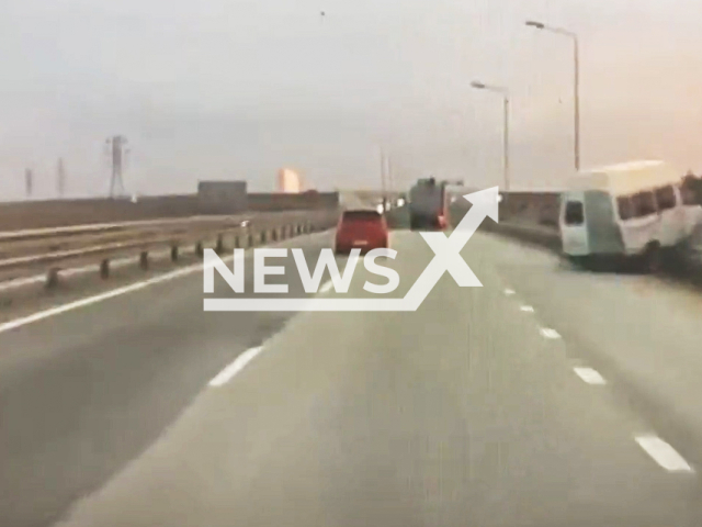 This image is a screen grab of the video supplied titled NewsX-VanFlipo-01.mp4: Footage shows a Gazelle van rolling head over heels into a ditch after being cut off by a car in Simferopol, Crimean Peninsula. Ukraine on Friday, Sep. 19, 2025.(Clipzilla/NX)