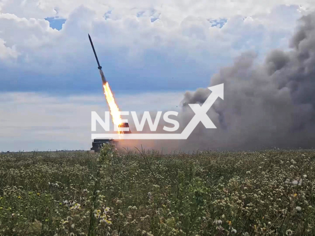 This image is a screen grab of the video supplied titled NewsX-RussianUragan-01.mp4: Footage shows a Russian Uragan MLRS crew firing a long-range salvo and subsequent drone footage confirming the strike on a Ukrainian stronghold in Vovchansk, Kharkiv Oblast, Ukraine on Friday, Sep. 26, 2025.(Clipzilla/NX)