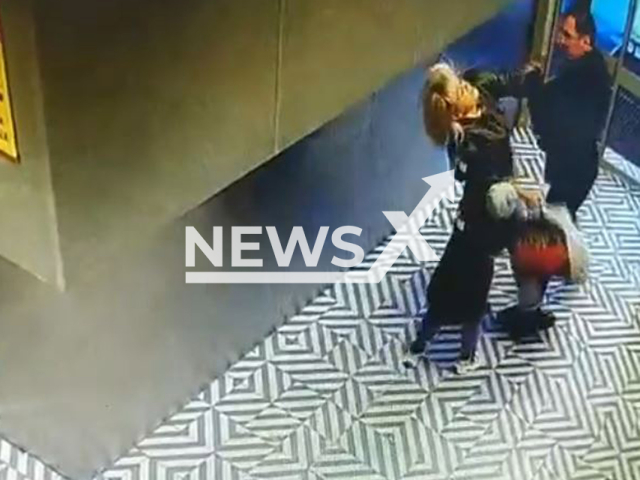 This image is a screen grab of the video supplied titled NewsX-ChildWoman-01.mp4: Footage shows man beating a woman in front of her child at a Pyaterochka store in Podolsk, Russia on Wednesday, Sep. 24, 2025.(Clipzilla/NX)