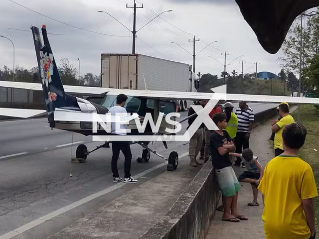 Picture shows the single-engine plane that landed on Regis Bittencourt highway, in Juquitiba, SP, in Brazil, Sep. 28, 2025. Note: Photo from FAB. (FAB/Newsflash/NX)