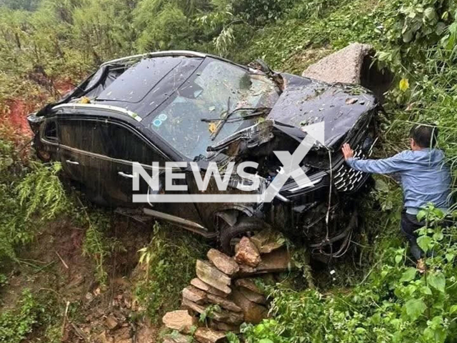 Picture shows the car that was pushed over cliff in Sa Pa, Vietnam, Sep. 29, 2025. All three occupants escaped. Note: Private photo. (Newsflash/NX)