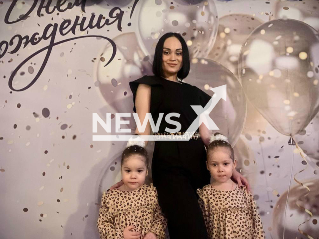 Picture shows the woman named as Elizaveta and her two daughters, undated. They were killed in Ulyanovsk, Russia, on Oct.1,2025. Note: Private photo. (Newsflash/NX)