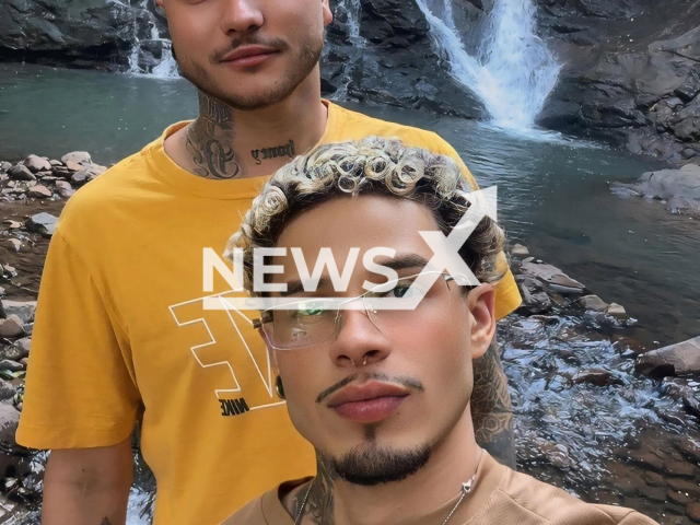Ruan Benayhur Braga, 24, (bottom) poses with boyfriend in undated photo. He died after falling from a waterfall in Igrejinha, Brazil. Note: Private photo taken from social media. (Newsflash/NX)