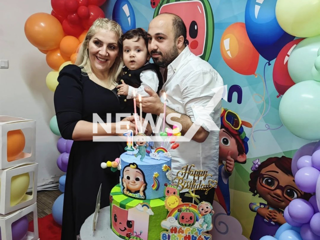 Picture shows baby Altay Toprak Kinali, 1, with parents, undated. He died in Izmir, Turkey as a result of poisoning from a pesticide. Note: Private photo taken from social media. (Newsflash)